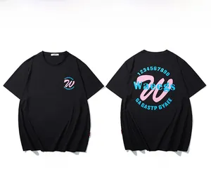 Detail of blue and pink graphic print on black cotton t-shirt with letter and number motifs