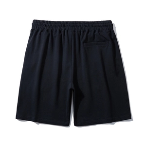 Men's loose black embroidered sports shorts with elastic waist and back pocket detail