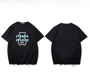 Detail view showing black cotton T-shirt with bear graphic and blue typography print