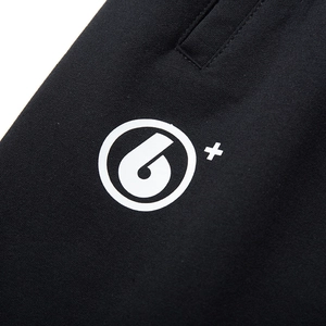 Men's loose black knit shorts featuring a white 6+ graphic print and soft texture