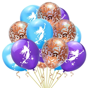 Close-up of mermaid latex balloons in blue and purple with rose gold confetti and ribbons