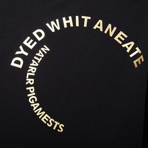 Oversized black cotton T-shirt featuring metallic gold circular letter print design