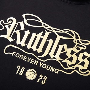 Oversized black cotton T-shirt featuring gold Ruthless graphic print and letter pattern
