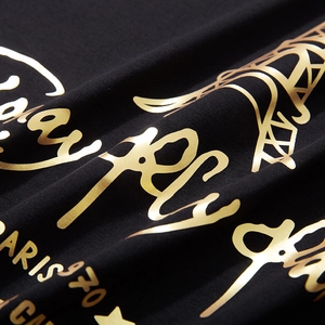 T-shirt noir ample pour homme avec impression métallisée dorée de la Tour Eiffel