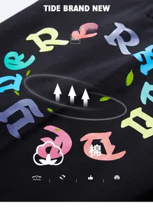 Macro view of cotton blend fabric with artistic colorful letter print on black joggers