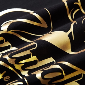 Men's oversized black cotton T-shirt with premium metallic gold letter printing