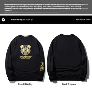 Détail d'un sweat noir avec imprimé panda géométrique et logo doré sur la manche