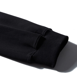 Men's loose fit crewneck long sleeve t-shirt featuring detailed black ribbed cuffs