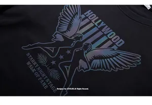 Detail of hoodie with holographic Hollywood print and reflective star graphics