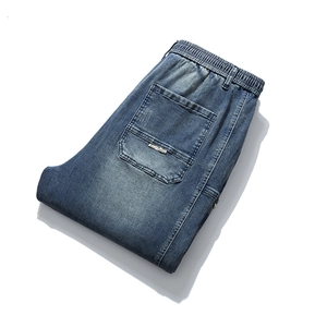 Blue washed denim joggers with elastic waist and logo embroidery on back pocket
