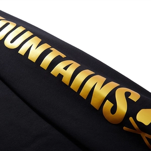 Men's loose black sweatshirt featuring metallic gold foil Mountains logo print