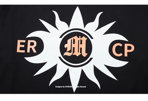 Detailed view of the sunray print and gothic lettering on a black cotton t-shirt