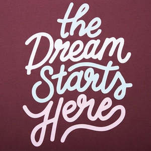 Men's oversized long sleeve cotton T-shirt in burgundy with Dream Starts Here print