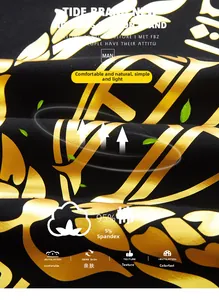Macro del tessuto nero con stampa a foglia dorata 95 percento cotone e 5 percento spandex