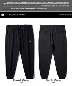 Front and back view of black joggers featuring colorful SIX print and elastic cuffs