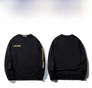 Front and back detail of black oversized sweatshirt with yellow FRGIMT logo and sleeve prints