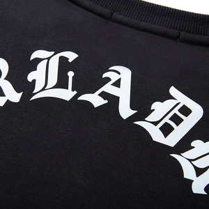 Sweat noir oversize avec lettrage gothique RLAD blanc imprimé sur l'encolure
