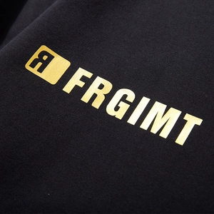 Loose fit black sweatshirt for men featuring premium gold foil lettering and logo design