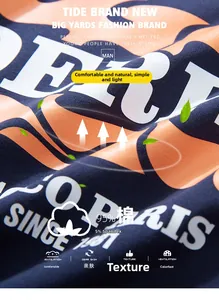 Détail du tissu en coton bleu marine avec impression de lettres orange de qualité