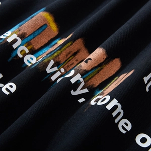 Men's oversized black sweatshirt with colorful graffiti art and artistic lettering detail