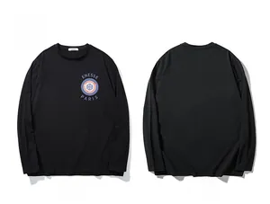 Front and back view of men's black long sleeve t-shirt with circular graphic chest print