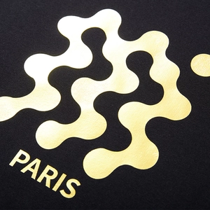 Oversized black sweatshirt with metallic gold wave print and Paris logo lettering