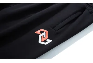 Detail of black cotton jogger with C-logo print and reinforced side pocket stitching