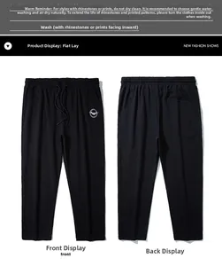 Detailed front and back view of men's plus size joggers with drawstring waist and bat logo