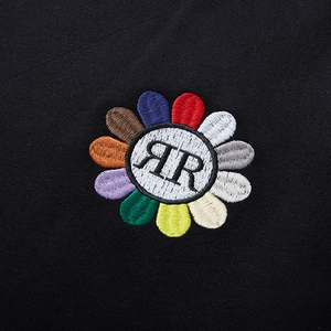 Men's oversized black sweatshirt featuring high-quality colorful flower embroidery details