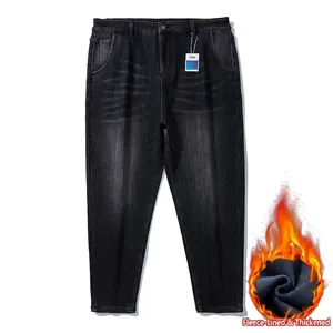 Men's dark gray fleece-lined straight jeans with YKK zipper and warm inner texture