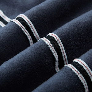 Fleece lined denim jeans in dark grey with striped ribbon detail for winter warmth