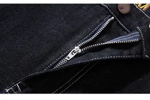 Detail of high-quality denim with YKK zipper, metal button and contrast stitching