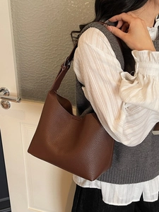 Retro dark brown pebbled leather shoulder bag with adjustable strap for daily commute