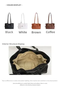 Close-up of internal lining and zipper pocket of the leather tote bag showing storage