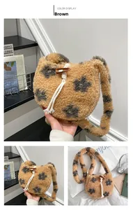 Detail of plush brown shoulder bag with star leopard pattern and toggle closure