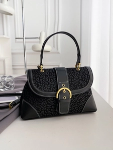 Vintage leopard print handbag with gold buckle and black leather trim for women