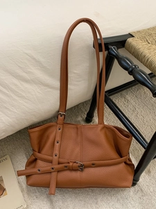 Minimalist brown lychee pattern leather shoulder bag with long straps for casual daily use