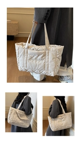 Detail of cream quilted tote bag with diamond stitching and elegant cursive embroidery