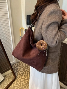 Retro burgundy suede tote bag for women featuring a plush star donut charm on shoulder