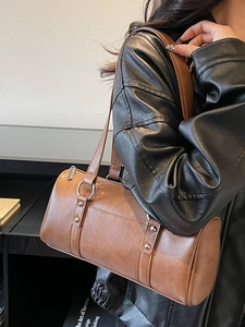 Retro brown cylinder handbag in PU leather with silver studs and long shoulder strap