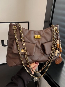 Vintage dark brown quilted chain shoulder bag with gold turn-lock and wooden bead charm