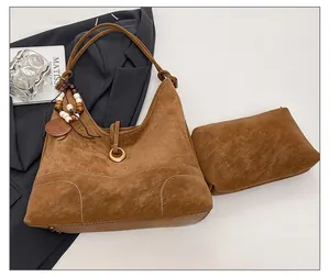 Brown suede tote bag set with beaded charm and white contrast stitching detail