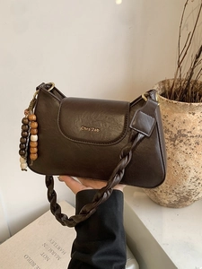 Brown faux leather crossbody bag with woven strap and colorful beads for women