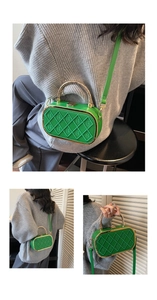 Macro detail of emerald green leather bag with quilted pattern and gold metal handle