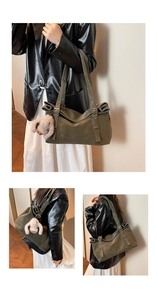 Three-way display of large olive green tote bag with adjustable strap and rabbit charm