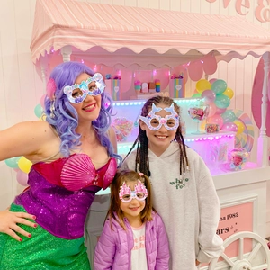 Mermaid party glasses with seashell, mermaid tail, and castle designs for kids' birthdays