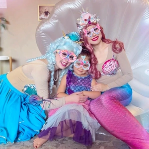 Mermaid party costumes and shell glasses for girls birthday celebration scene
