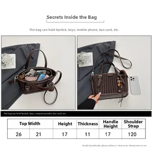 Guide des tailles du sac seau vintage avec dimensions 26x17x11 cm et capacité interne