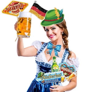 Detail of Oktoberfest photo booth props featuring beer mugs, wurst, and Bavarian hats