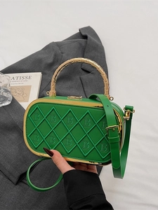Green leather quilted handbag with embroidered B pattern and gold textured top handle